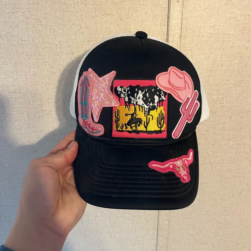 Western-Themed Black and White Hat with Pink Accents
